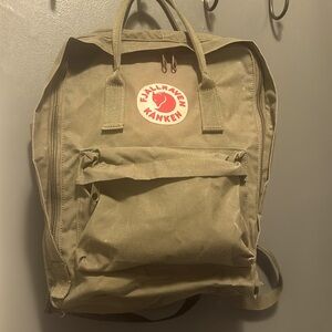 Fjallraven Kanken Olive Green backpack. Like new, no stains or tears. Perfect .